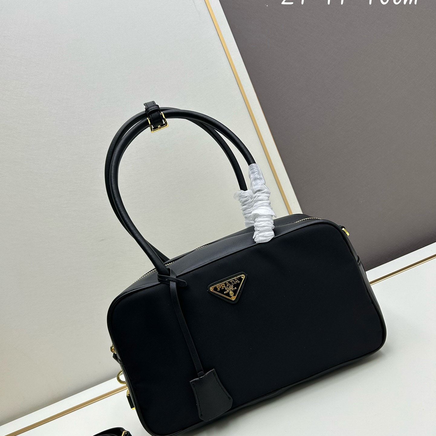 Pra*a top handle bags